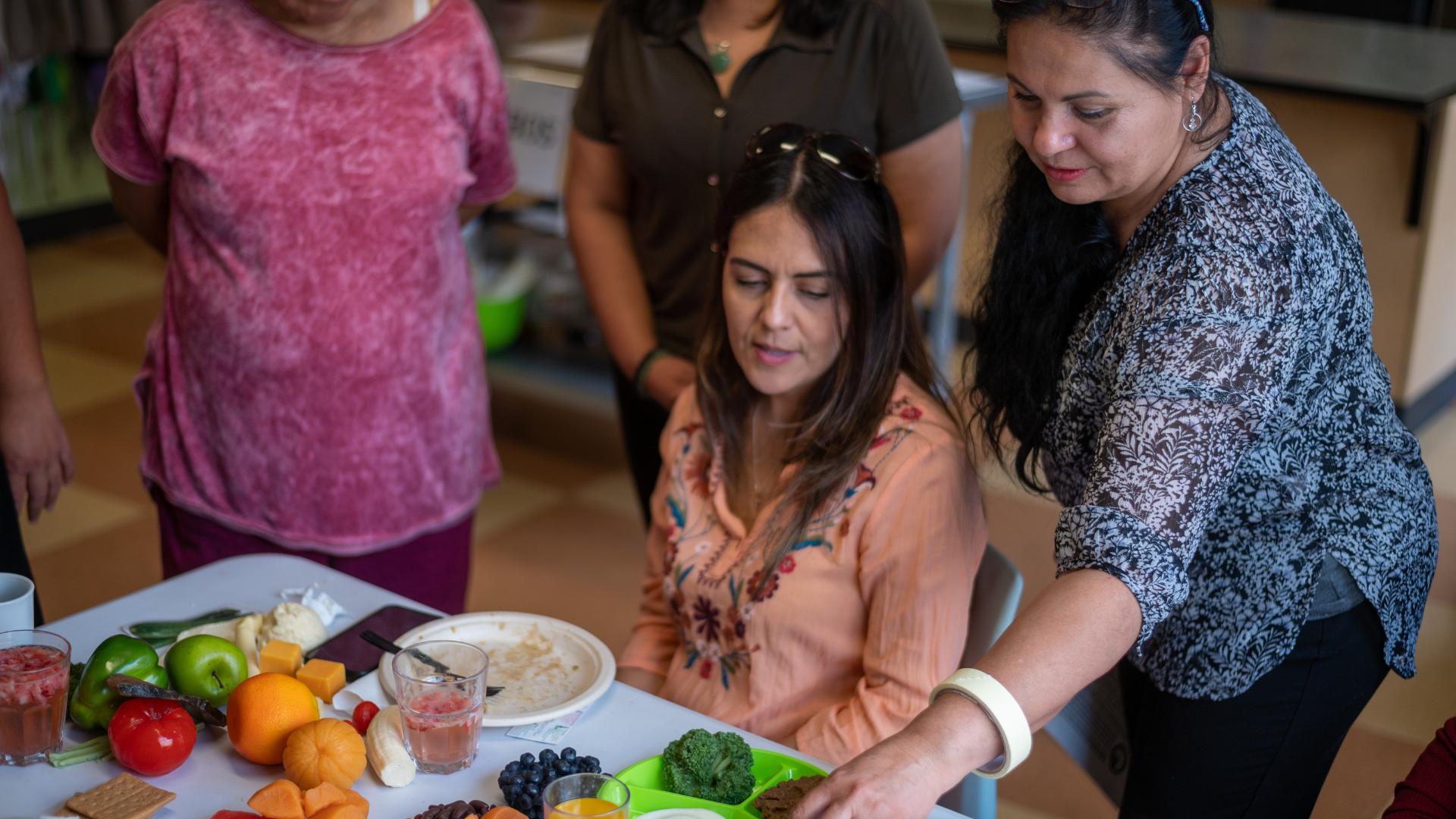 4 women in a cooking class