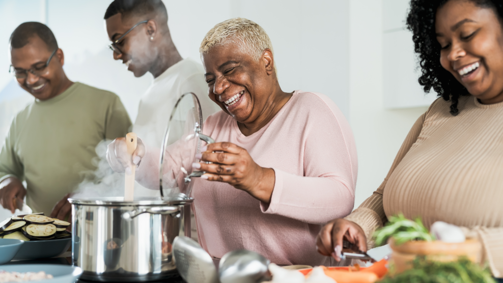 Black Family Happily Cooking Together